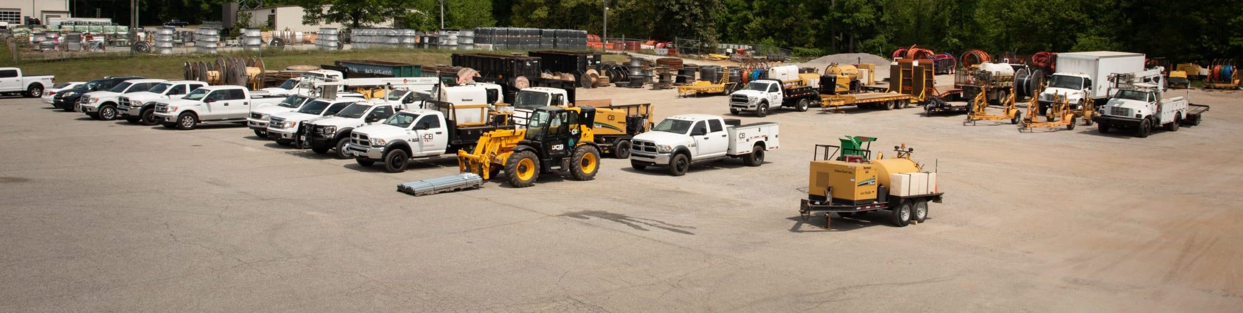 Vehicles and equipment that are lined up and ready to be taken out on site